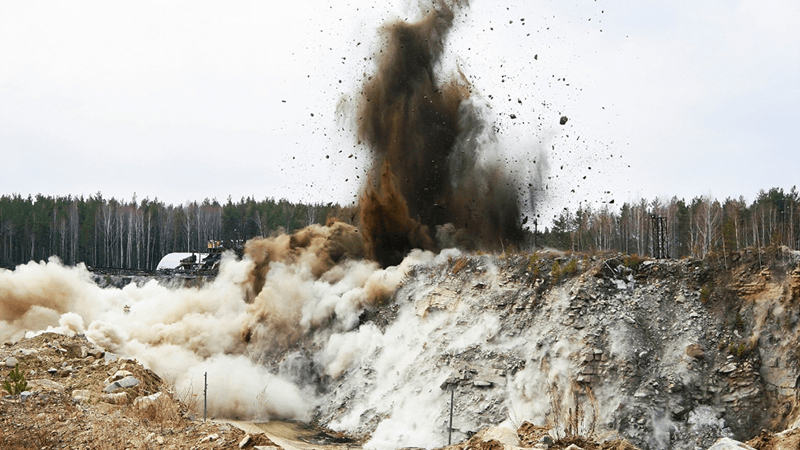 Excavating rock by blasting